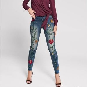 Medium wash skinny jean with floral print